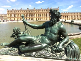 Bronze Sculpture In The Garden Of Versailles