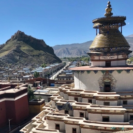 Gyantse Kumbum Stupa and Dzong castle in the distance